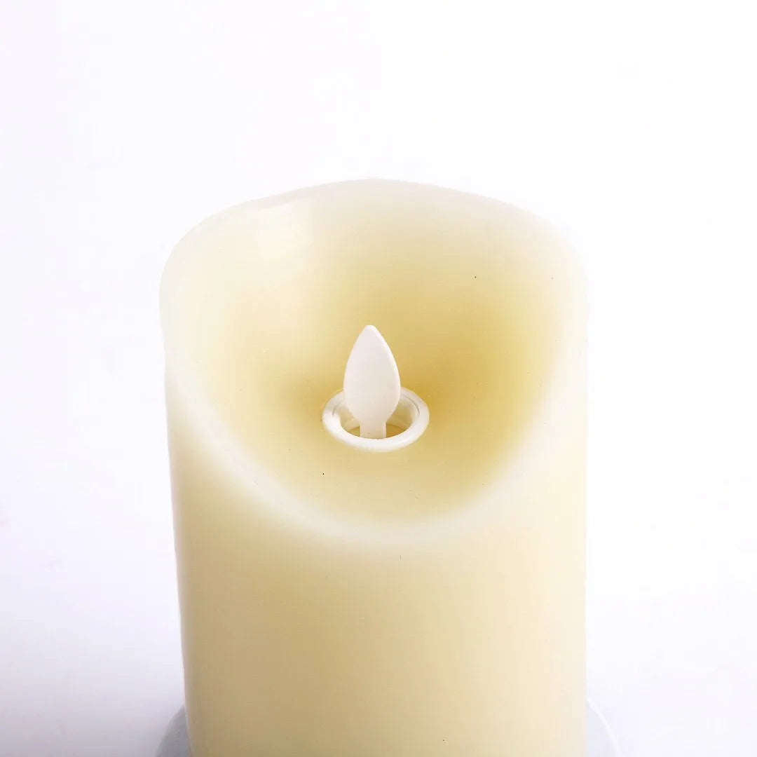 MARVELOUS LIGHTS FLAMELESS CANDLE IVORY W/CROSS 3.25 X 5 IN