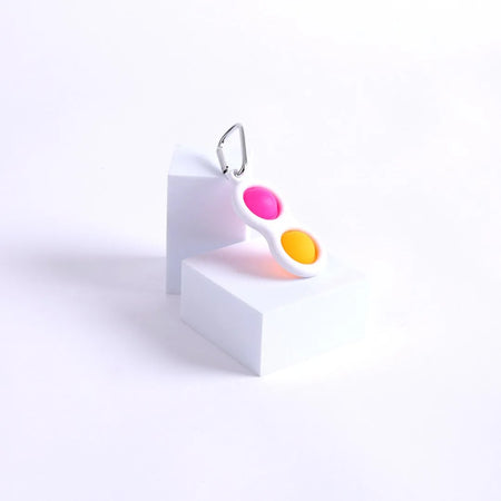 PEACE POPPER KEY CHAIN ASST COLORS