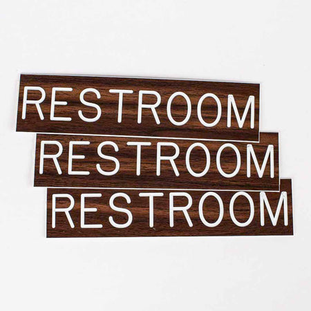 SIGN ENGRAVED RESTROOM ADHESIVE BACK WALNUT