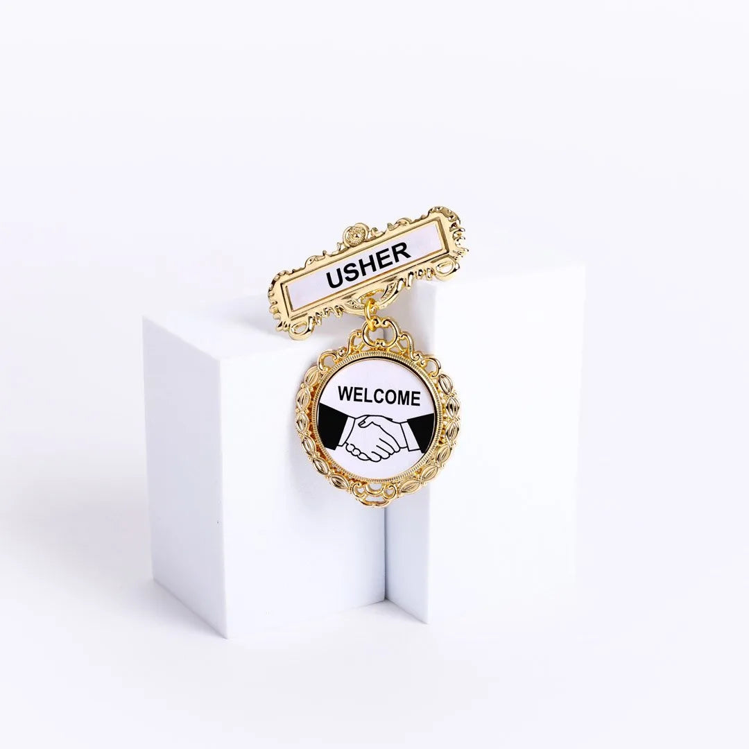 BADGE FANCY ROUND USHER SHAKING HANDS PIN