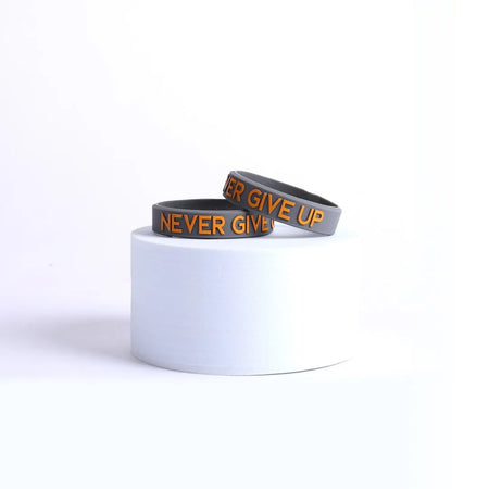 POWER BAND NEVER GIVE UP SM 1/2" - PK12