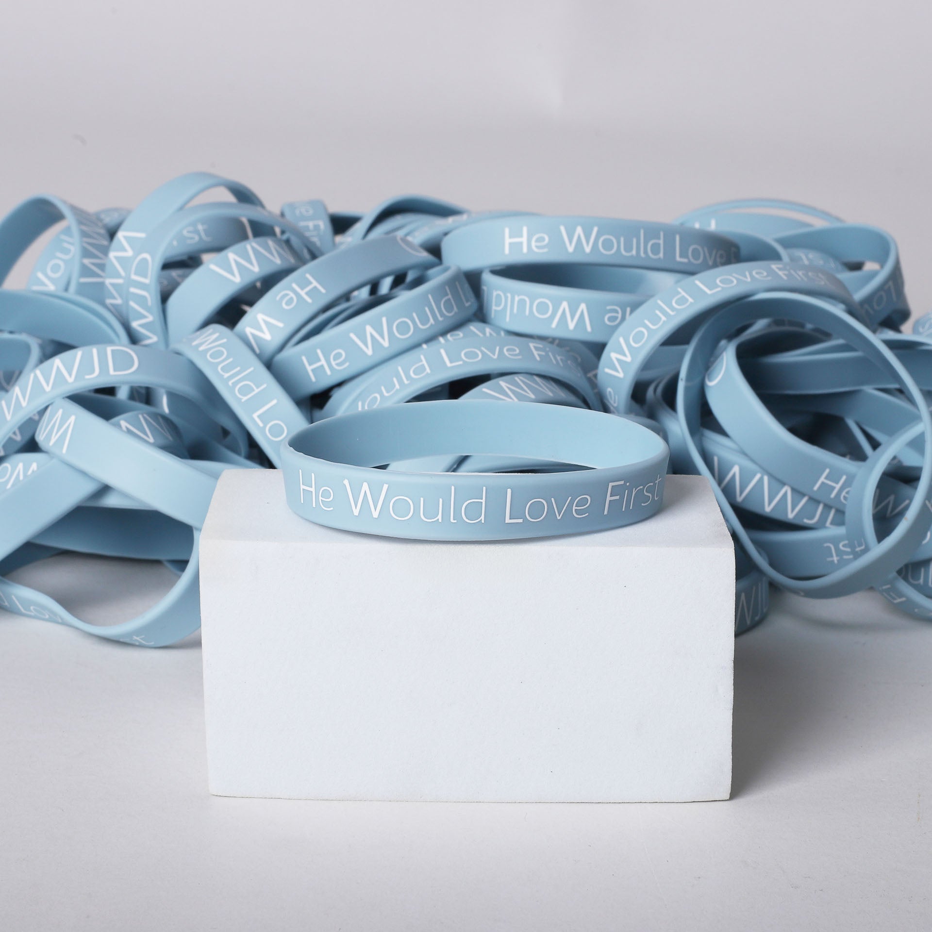 BRACELET SILICONE WWJD HE WOULD LT BLUE PK100