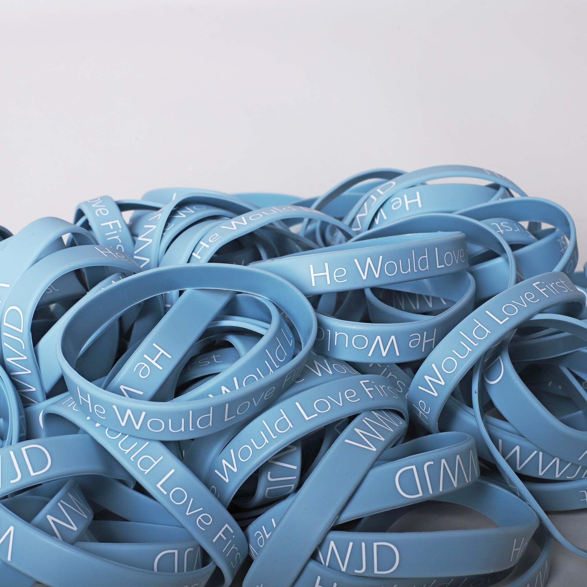 BRACELET SILICONE WWJD HE WOULD LT BLUE PK100