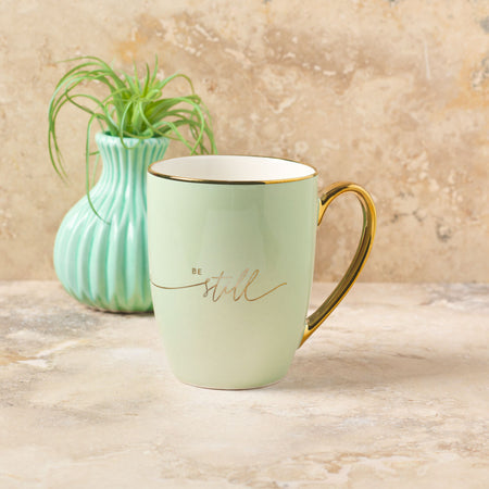 Be Still Soft Green and Gold Ceramic Coffee Mug by Christian Art Gifts, product view 4