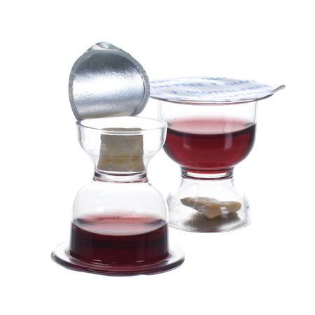 WCC Chalice Communion prefilled communion cup with sacramental wine and gluten-free bread, lid partially opened