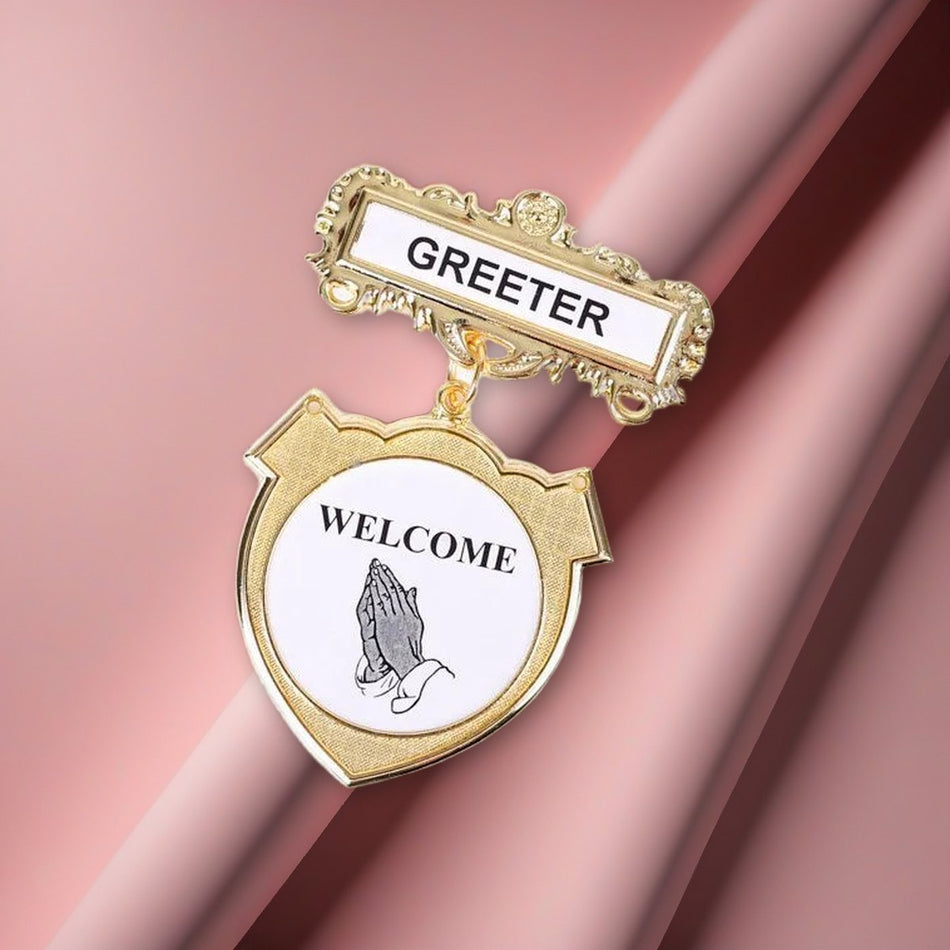 Badge Shield Greeter Ethnic Praying Hand Magnet on a blush pink backdrop