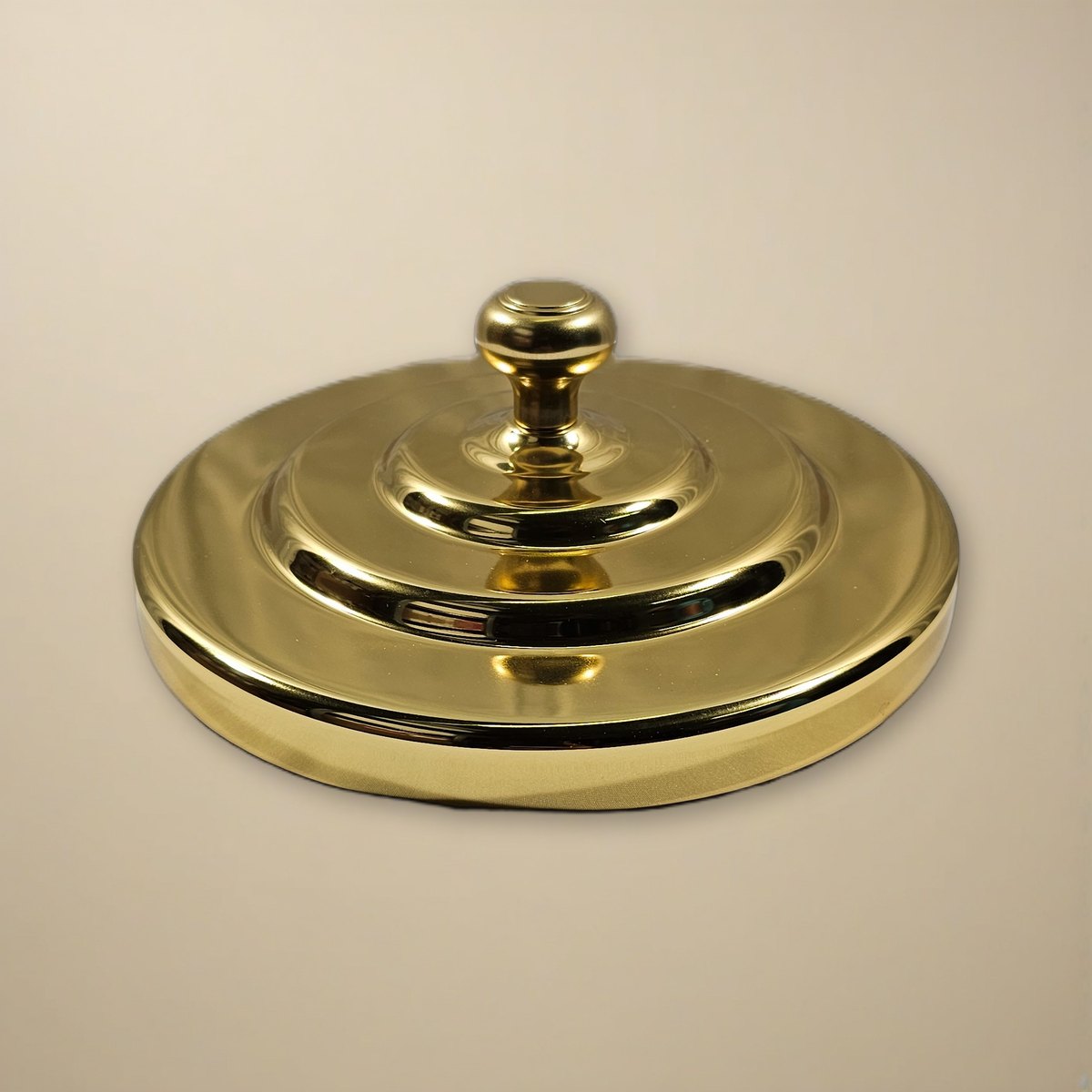 Bread Plate Cover with Plain Knob - Brasstone Aluminum by Artistic on a cream backdrop
