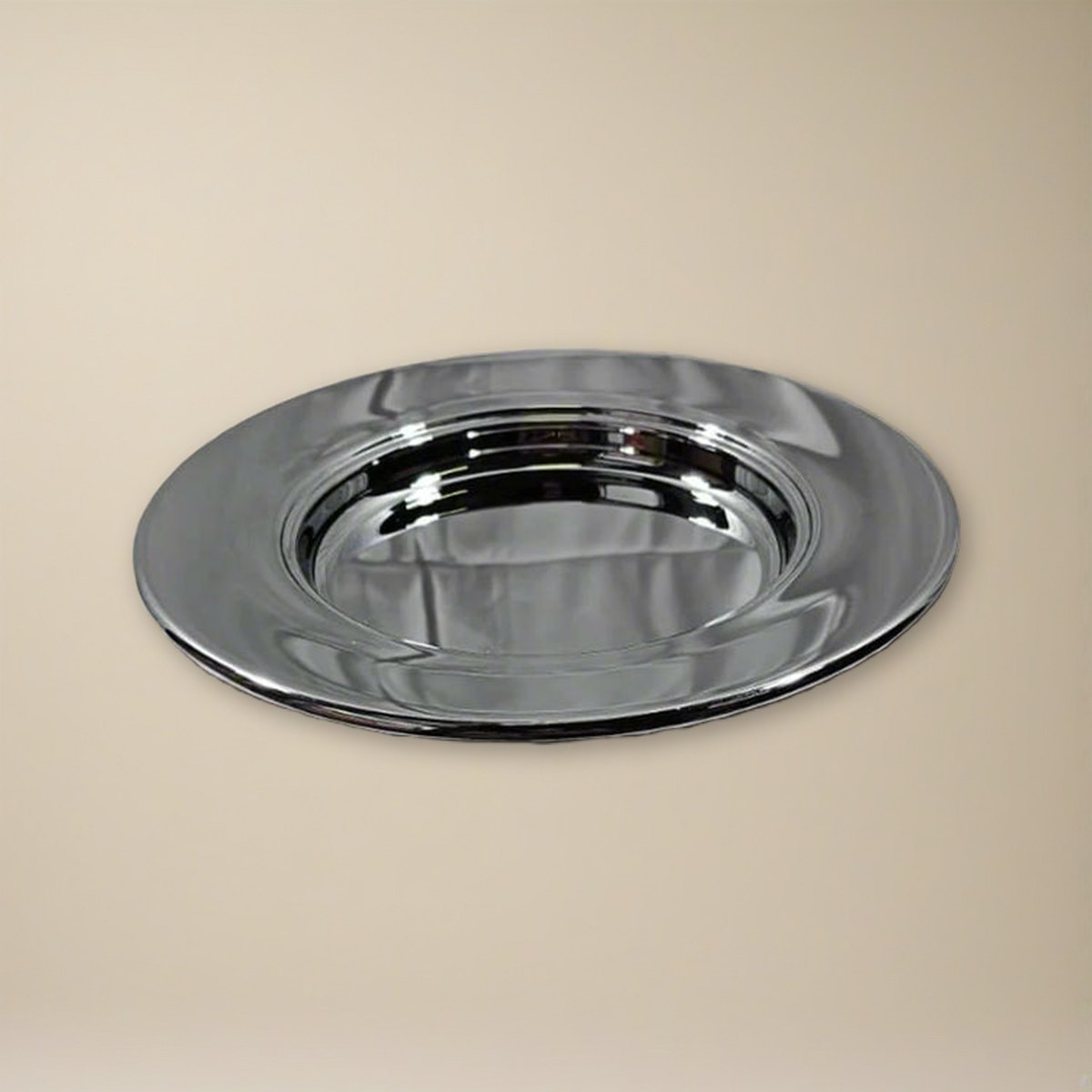 Bread Plate - Solid Chrome by Artistic on a cream backdrop