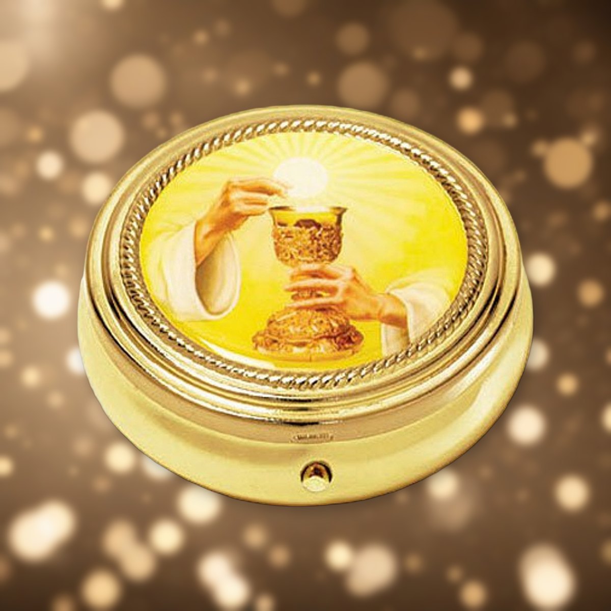 Chalice Pyx against soft golden light