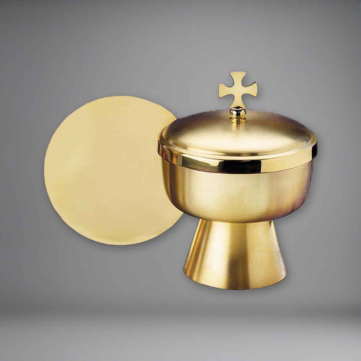 Ciborium with Cross Top on a soft grey backdrop