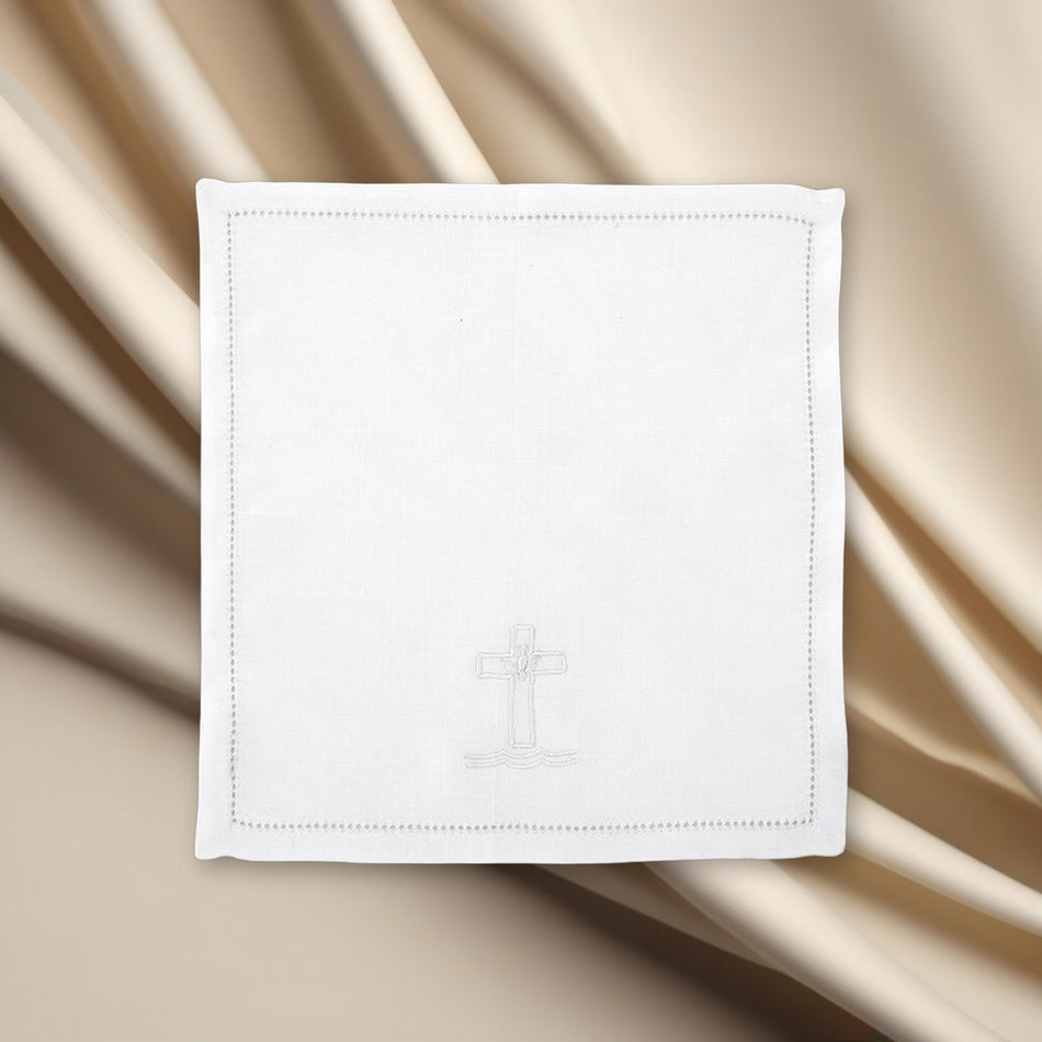 Cross & Dove Baptismal Napkin - Pack of 4 on a cream backdrop