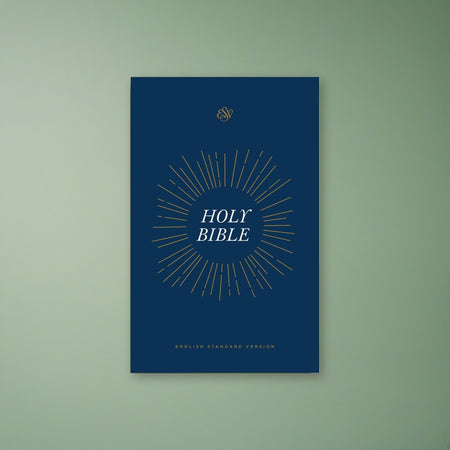 ESV Share the Good News® Outreach Bible on a sage green backdrop