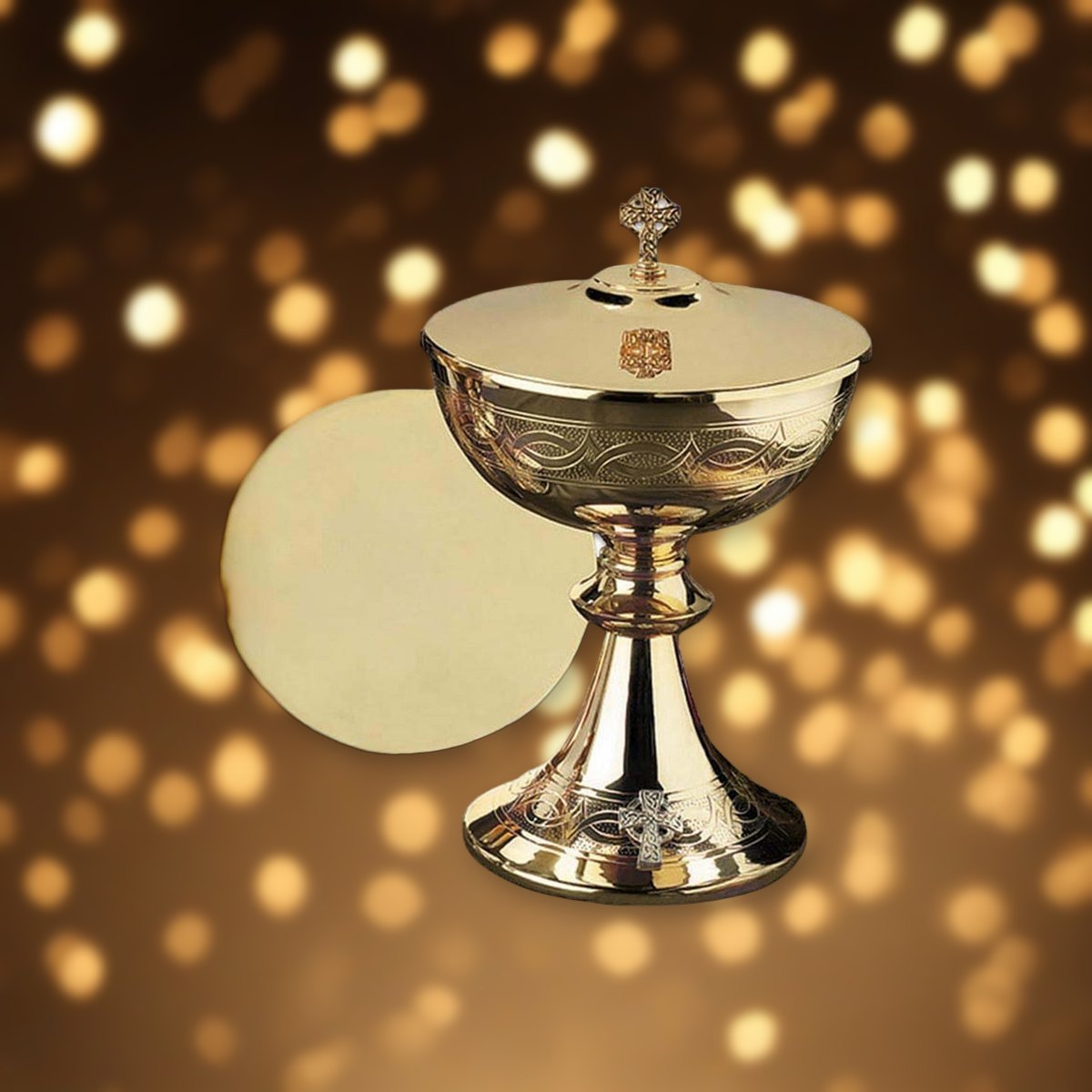 Etched Celtic Cross Ciborium with Cover against soft golden light