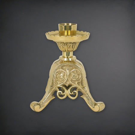 Europa Short Brass 8" Tall Altar Candlestick on a charcoal backdrop