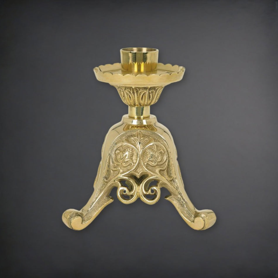 Europa Short Brass 8" Tall Altar Candlestick on a charcoal backdrop