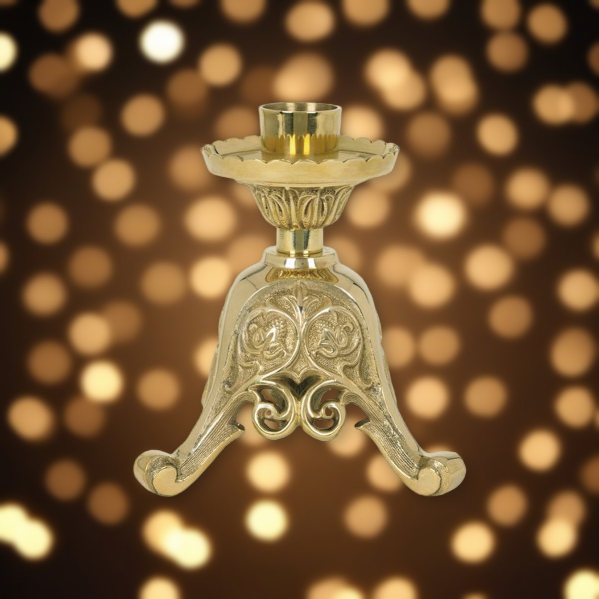Europa Short Brass 8" Tall Altar Candlestick against soft golden light