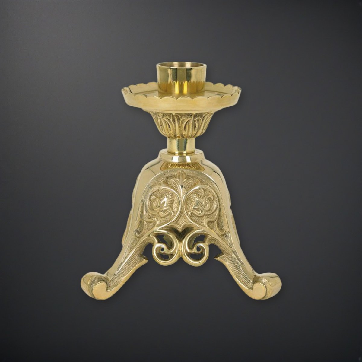 Europa Short Brass 8" Tall Altar Candlestick on a charcoal backdrop