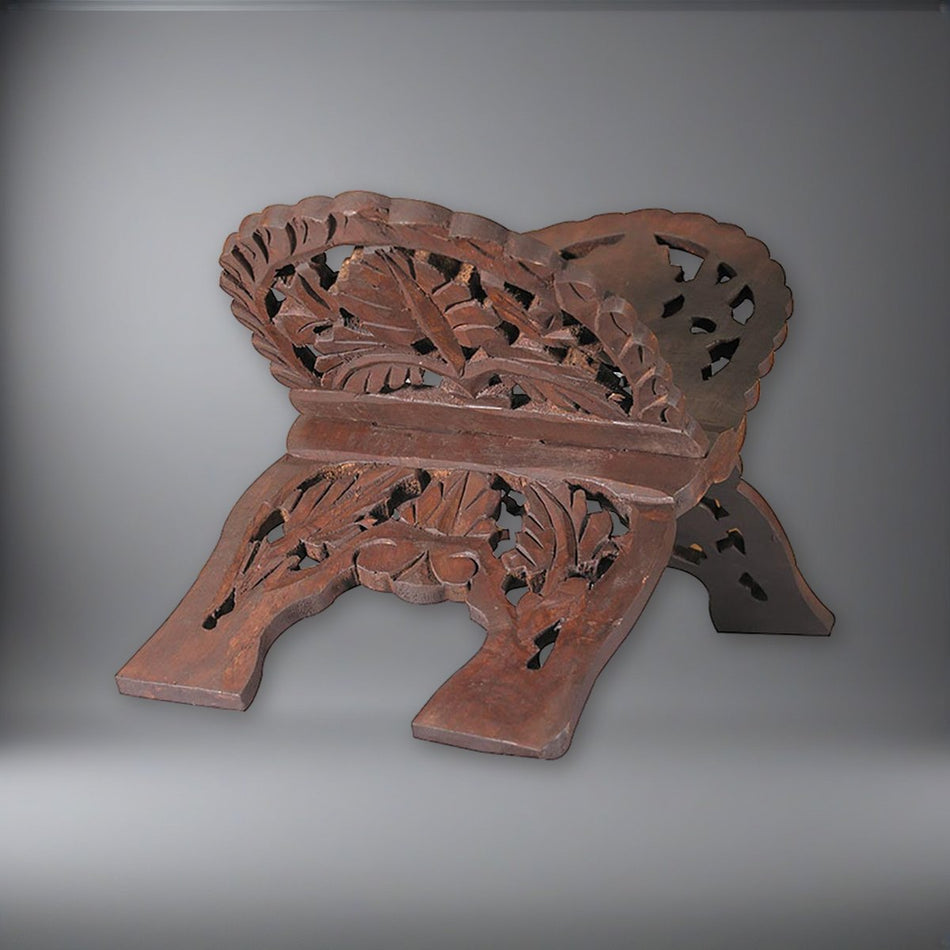 Hand Carved Wood Bible Stand on a soft grey backdrop
