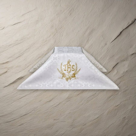Embroidered IHS Chalice Veil on a stone background