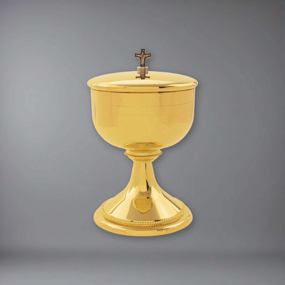 Our beautiful Ciborium plated in 24k gold on a soft grey backdrop