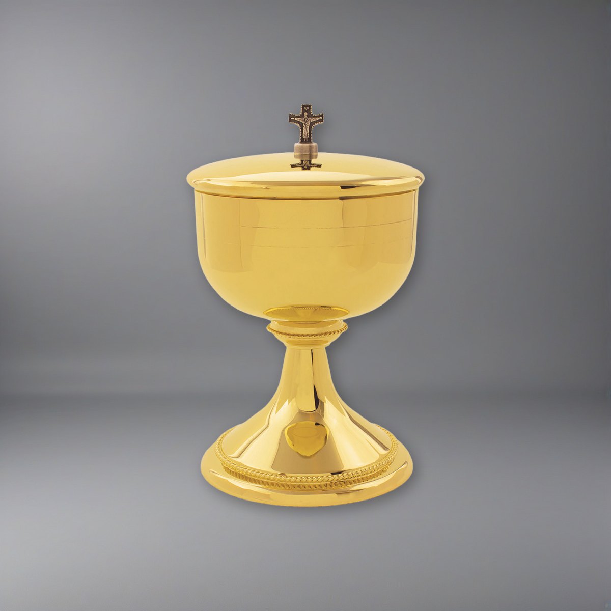 Our beautiful Ciborium plated in 24k gold on a soft grey backdrop