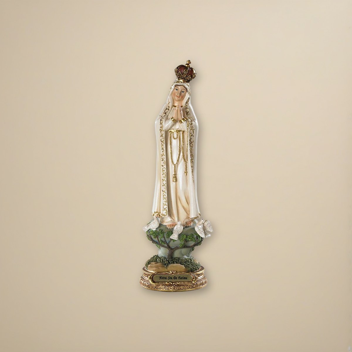 Our Lady of Fatima Statue on a cream backdrop