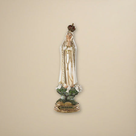 Our Lady of Fatima Statue on a cream backdrop