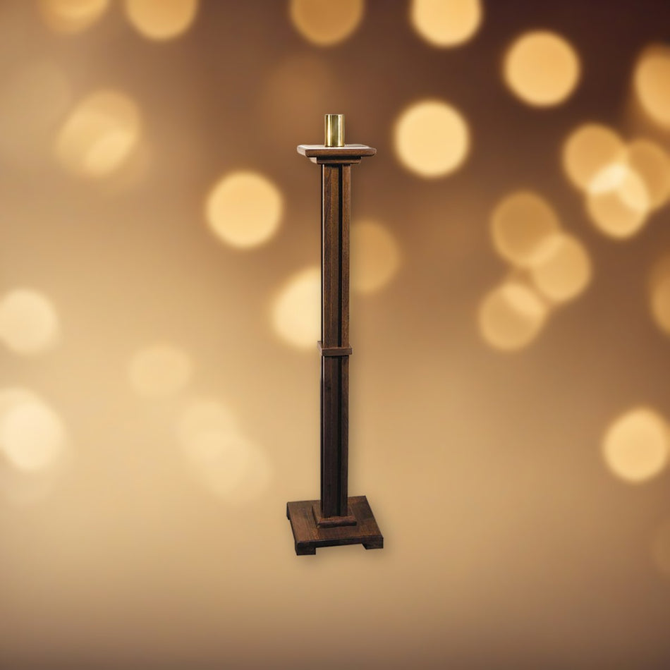 Walnut Paschal Candleholder - 43" Tall against soft golden light