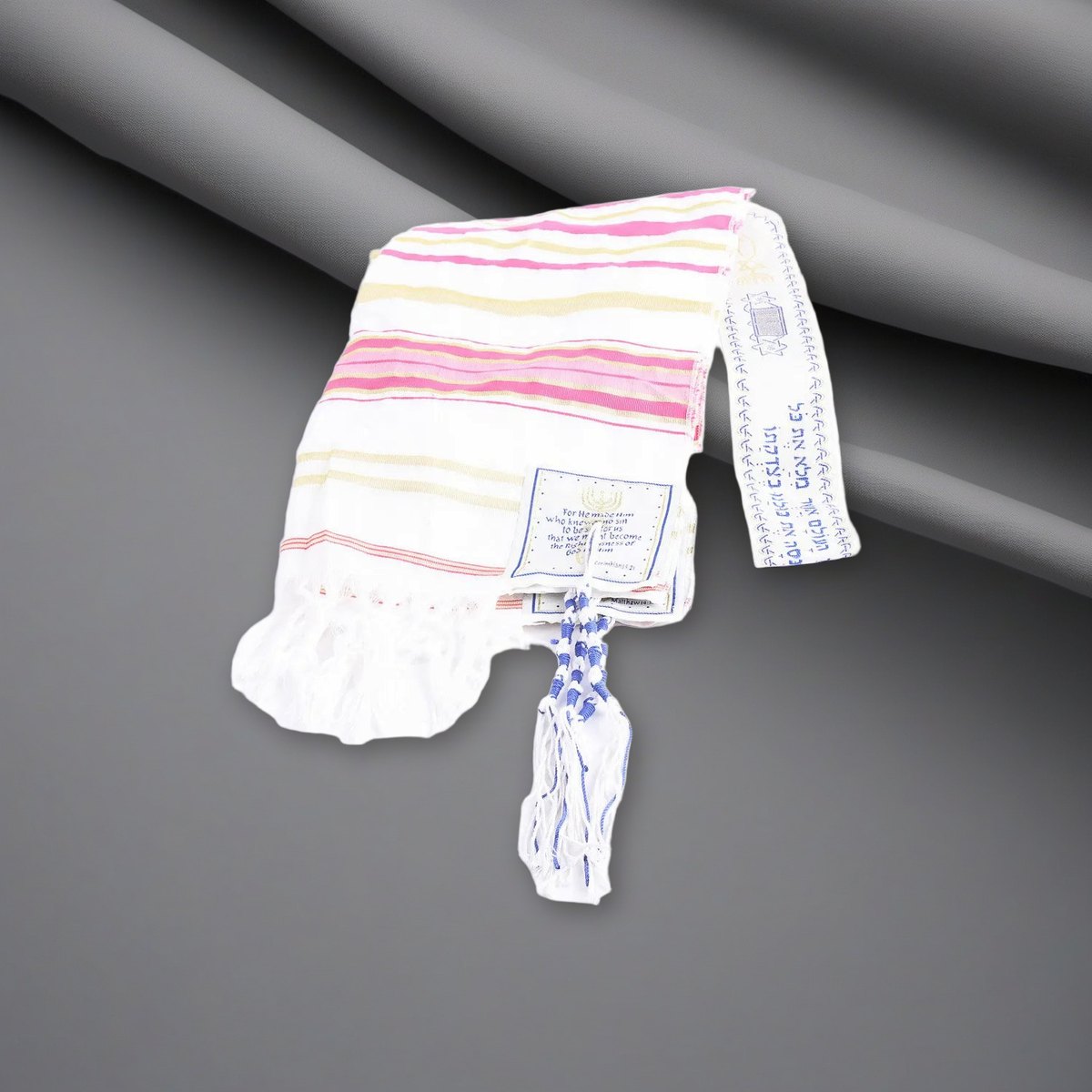 Prayer Shawl - Gold and Pink - Traditional Messianic with Tallit on a soft grey backdrop