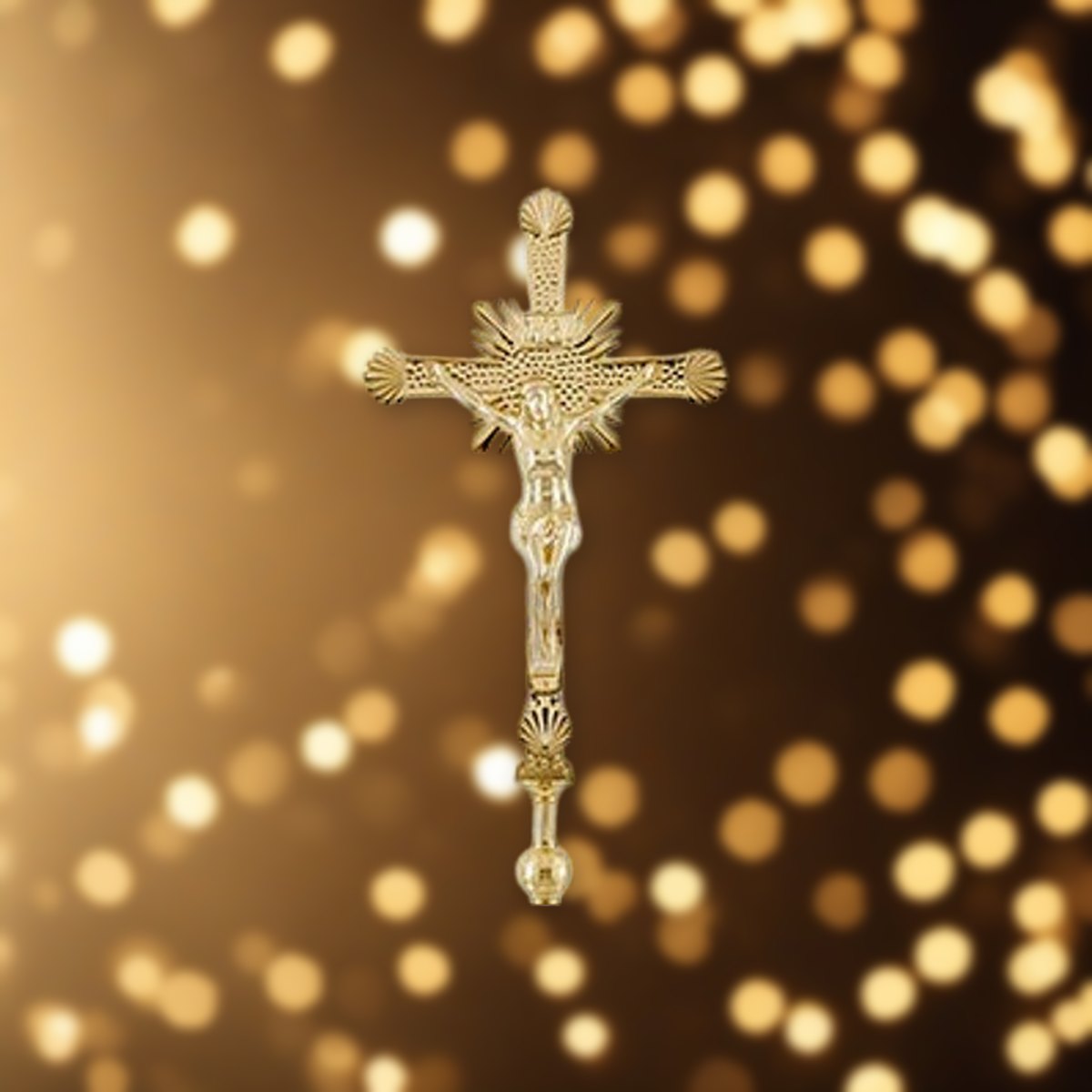 Processional Crucifix | Solid Brass against soft golden light