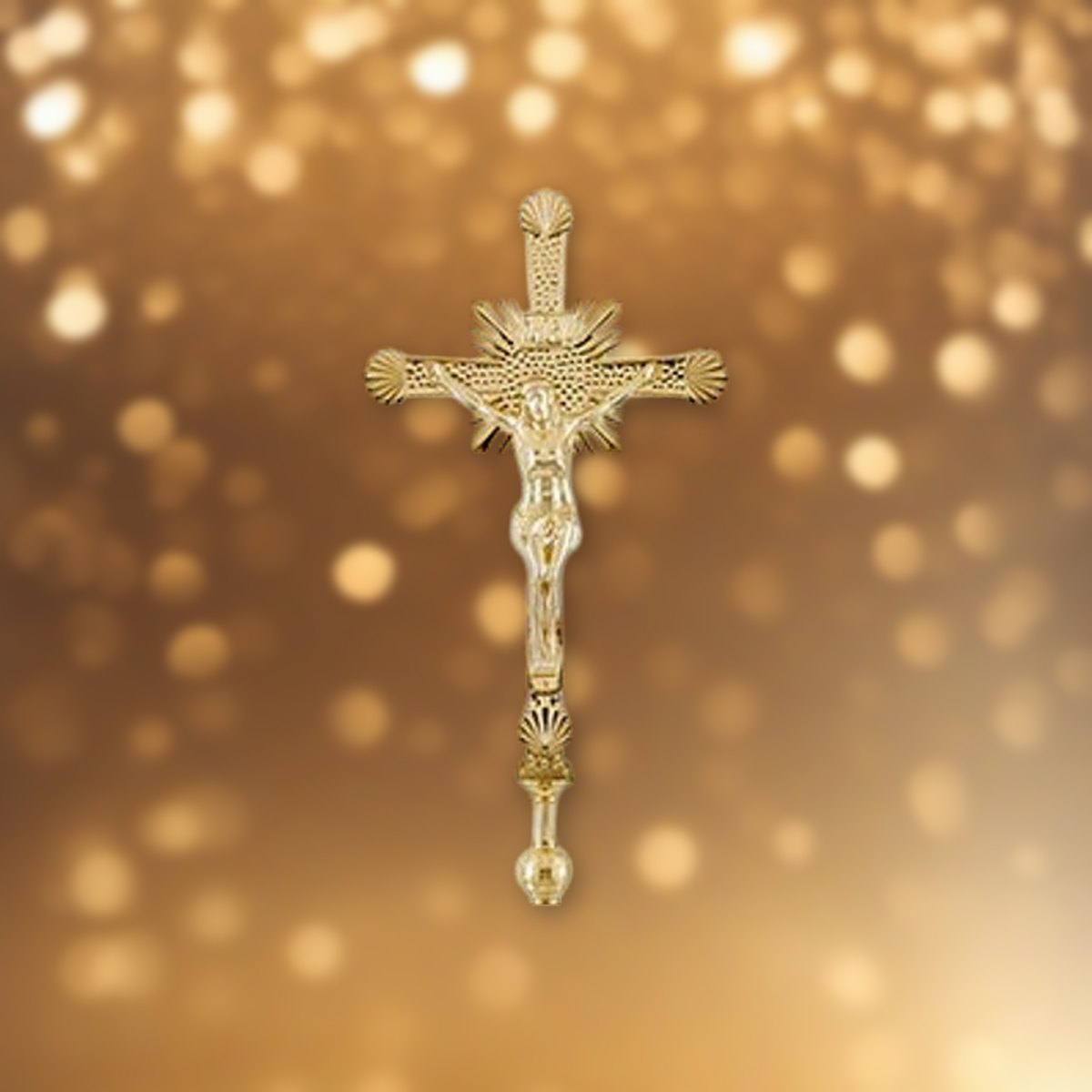 Processional Crucifix | Solid Brass against soft golden light