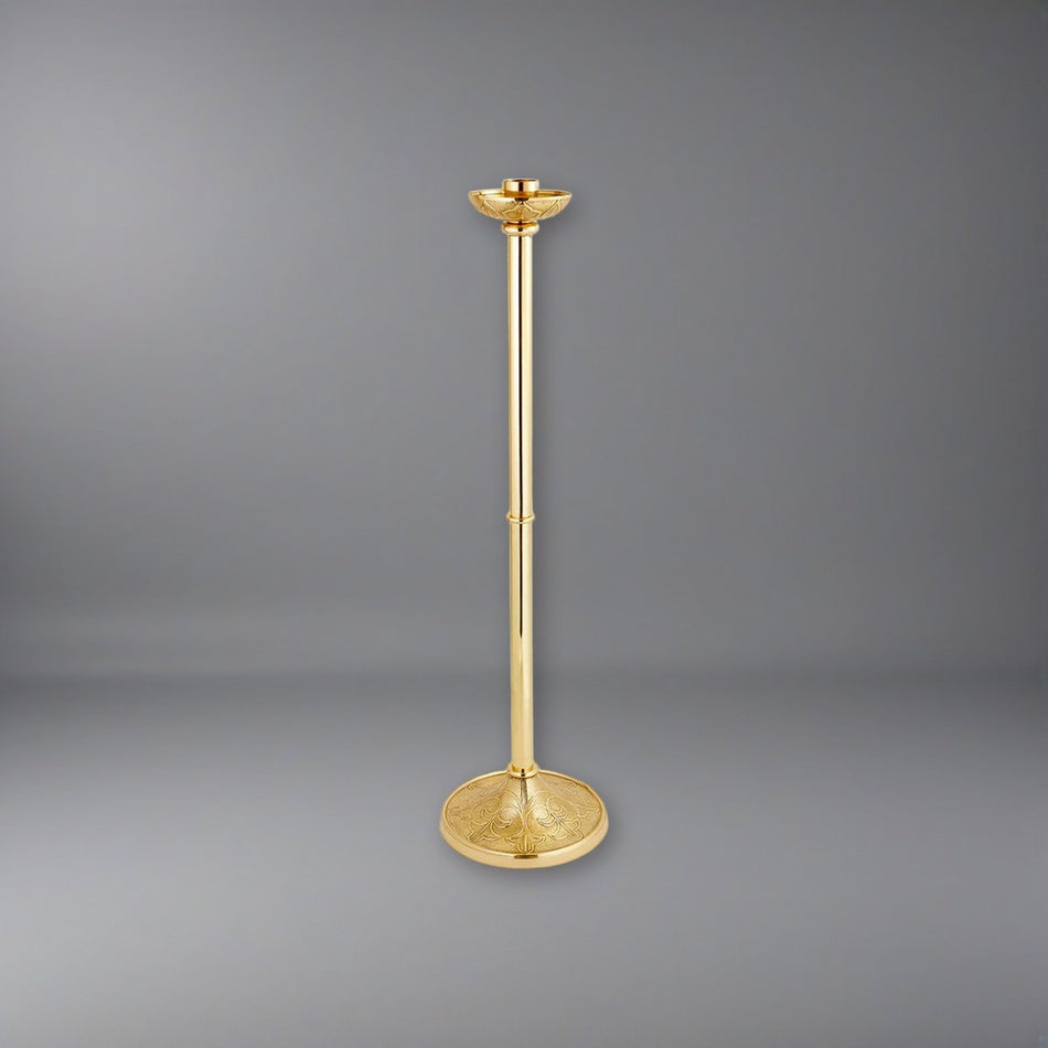Siena Series Brass 44" Tall Paschal Candlestick on a soft grey backdrop