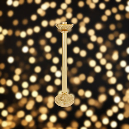 Siena Series Brass 24" Tall Altar Candlestick against soft golden light