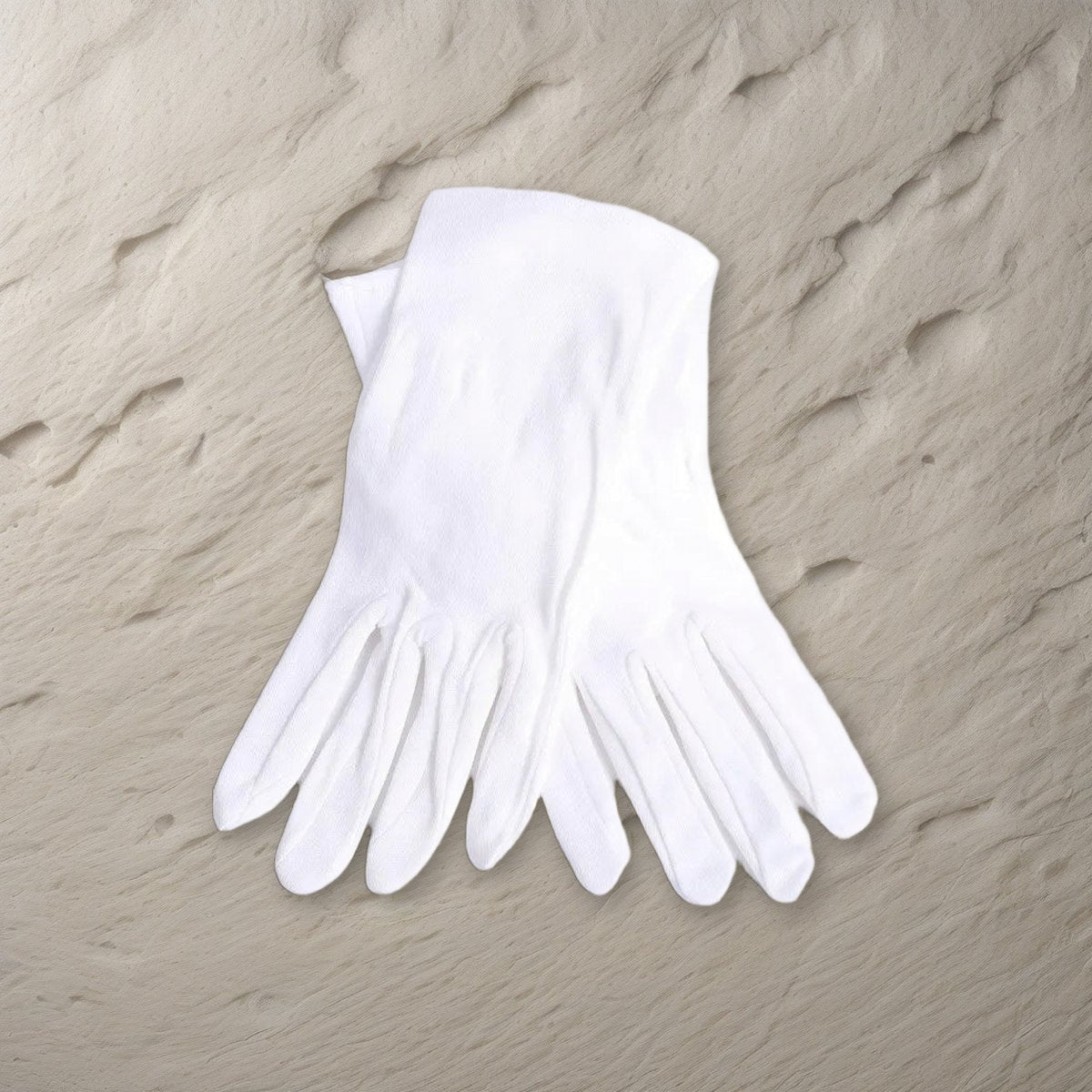 Plain White Cotton Worship Gloves - 2XL on a stone background