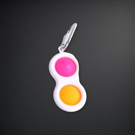 Peace Popper Key Chain Asst Colors Key Ring on a charcoal backdrop