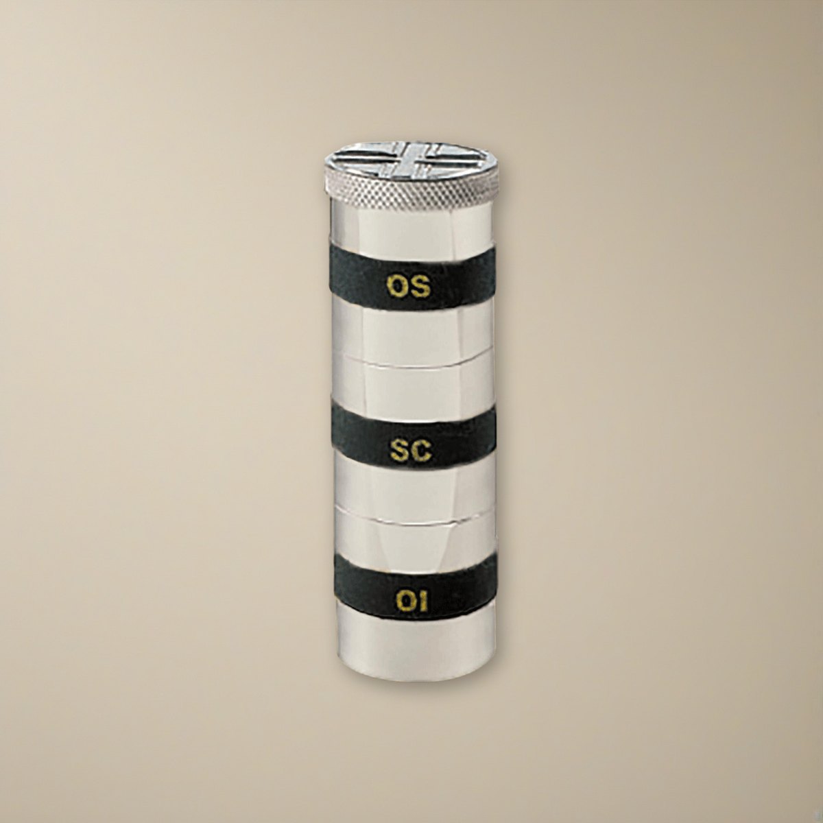 Triple Oil Stock on a cream backdrop