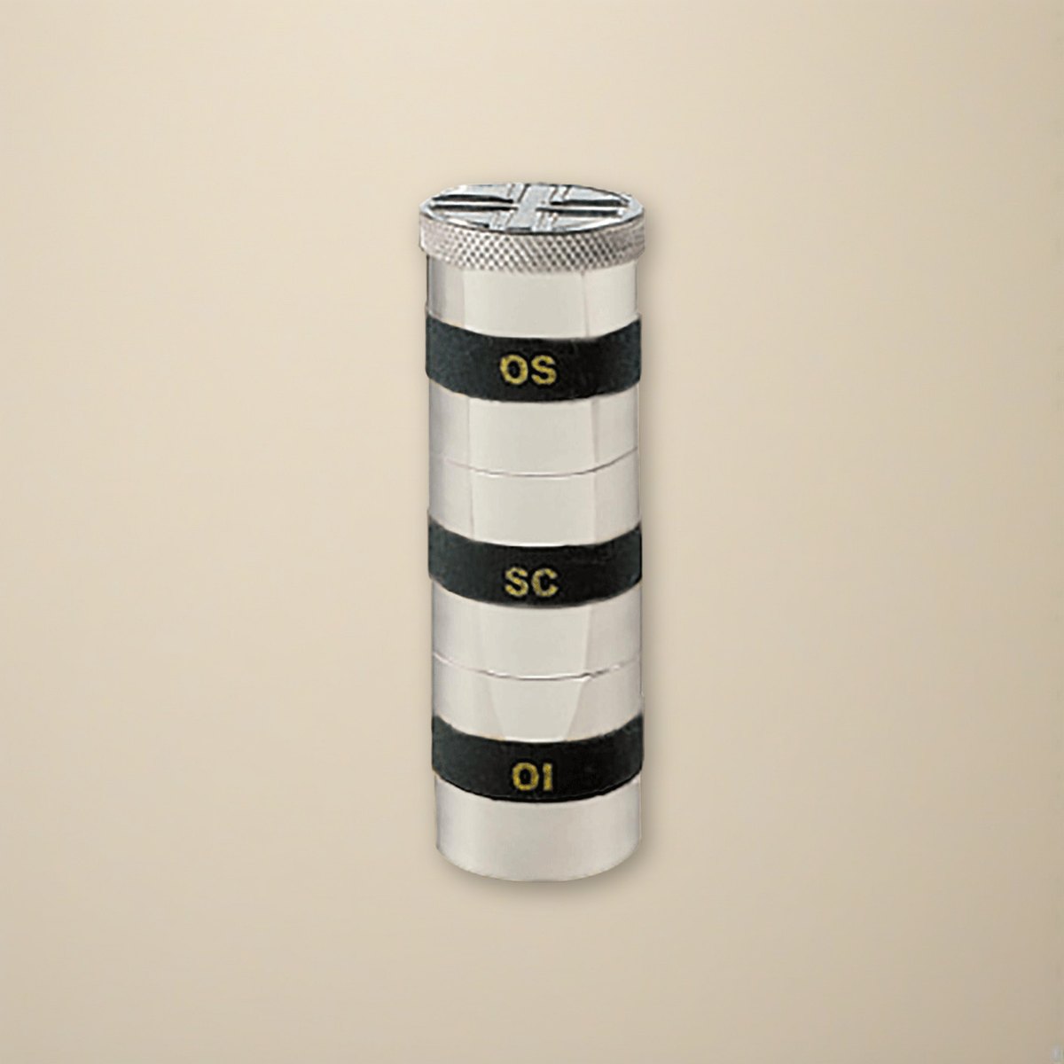 Triple Oil Stock on a cream backdrop