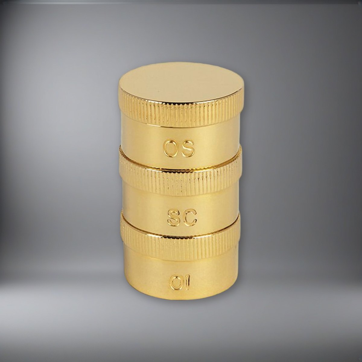 Triple Oil Stock set | Brass on a soft grey backdrop