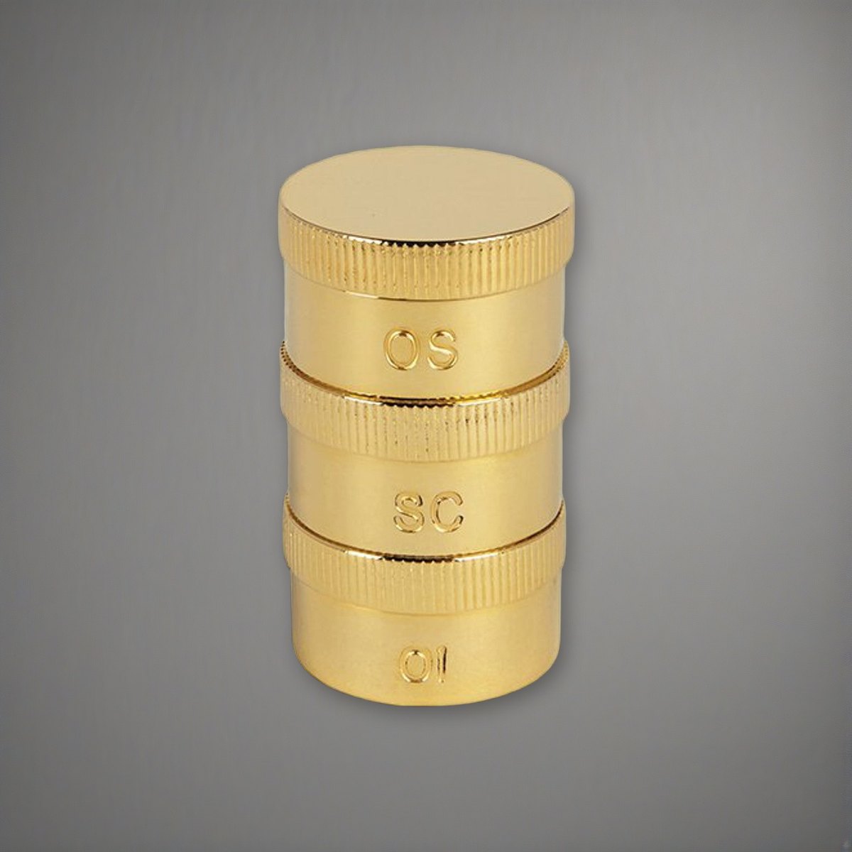 Triple Oil Stock set | Brass on a soft grey backdrop