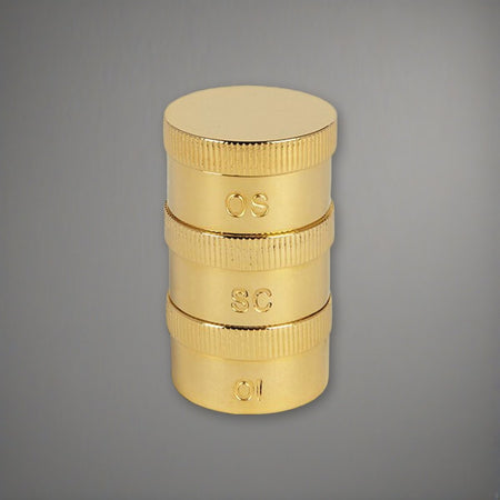 Triple Oil Stock set | Brass on a soft grey backdrop
